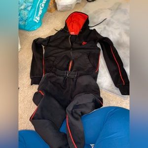 Like new black and red Nike sweatsuit size small